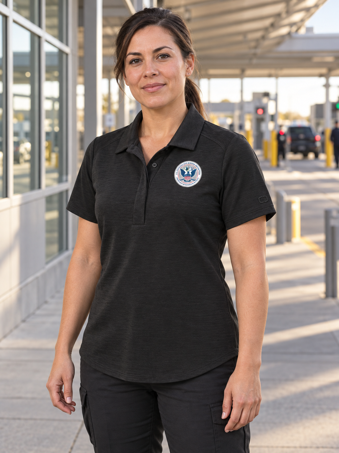 CBP Women's Polo — Black lifestyle view