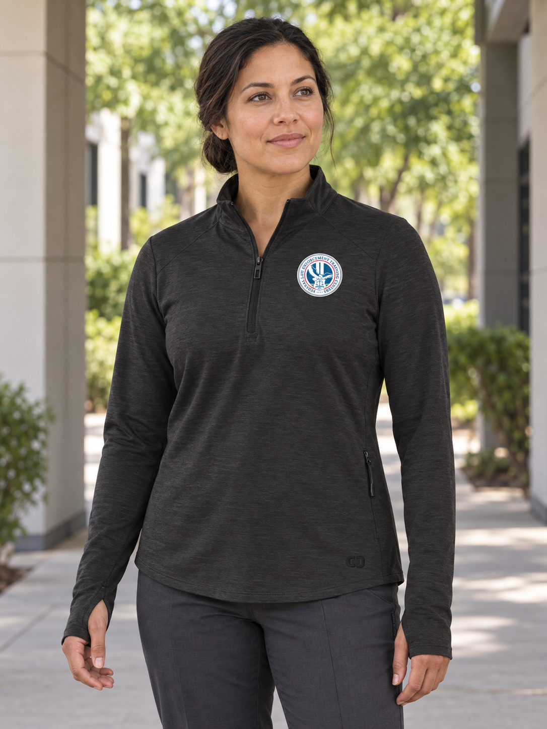 FLETC Women's Motion 1/4 Zip — Black lifestyle product photograph