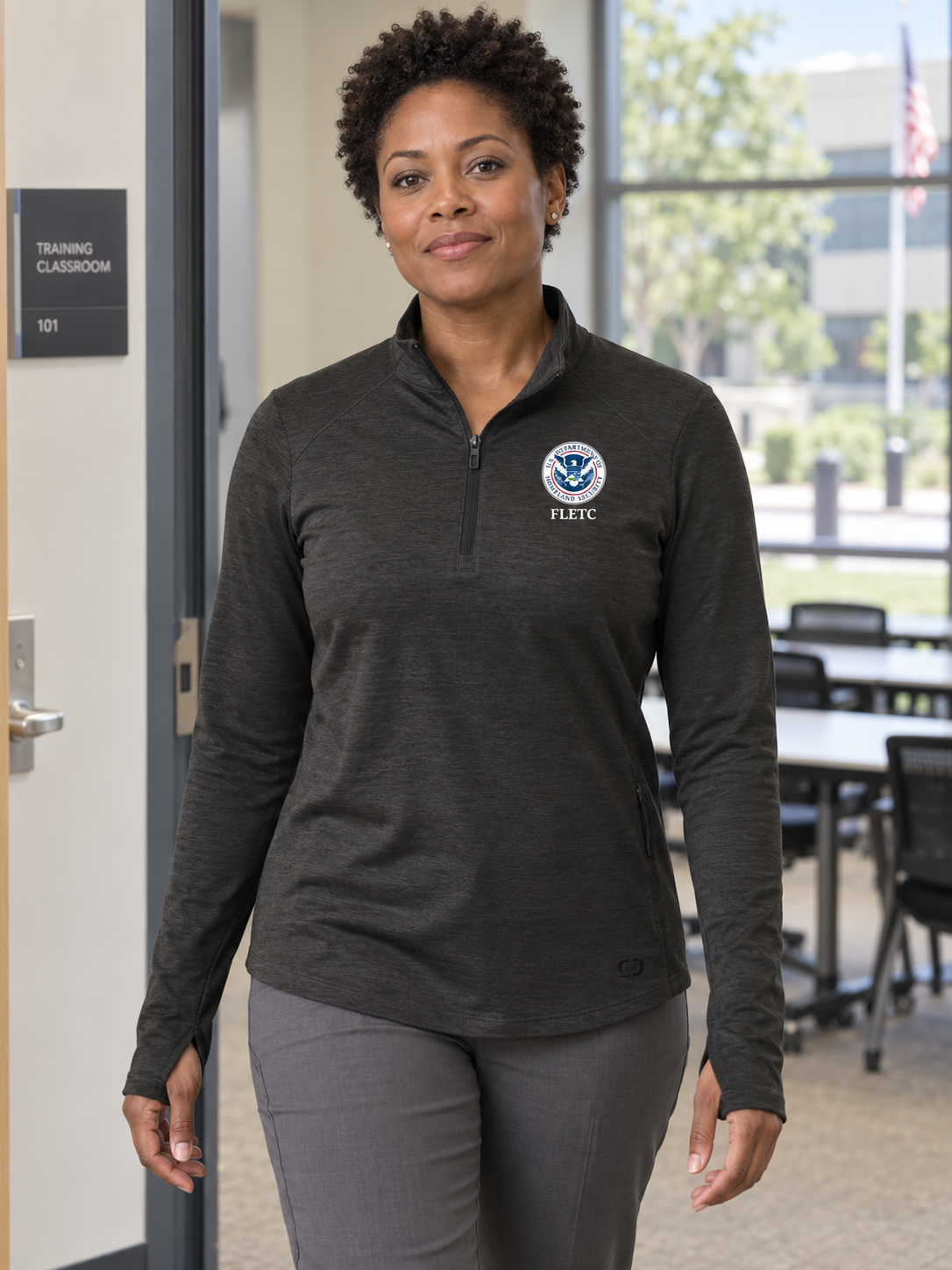 FLETC Women's Motion 1/4 Zip — Black lifestyle product photograph