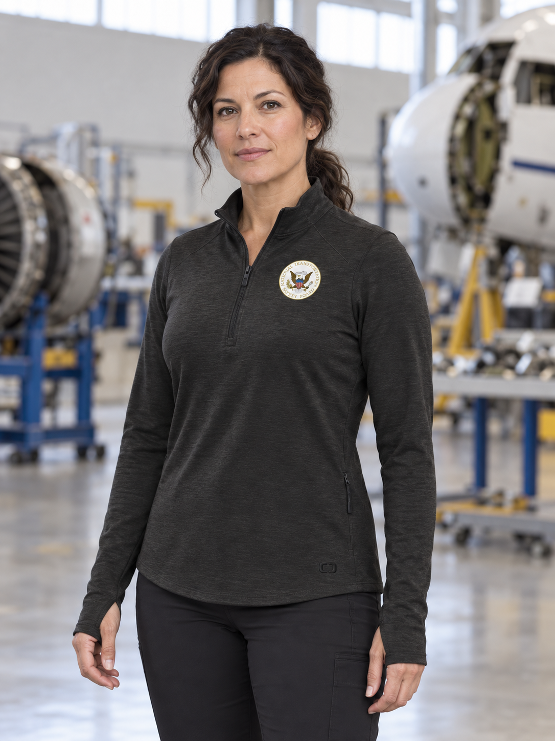 NTSB Women's Motion 1/4 Zip — Black lifestyle product photograph