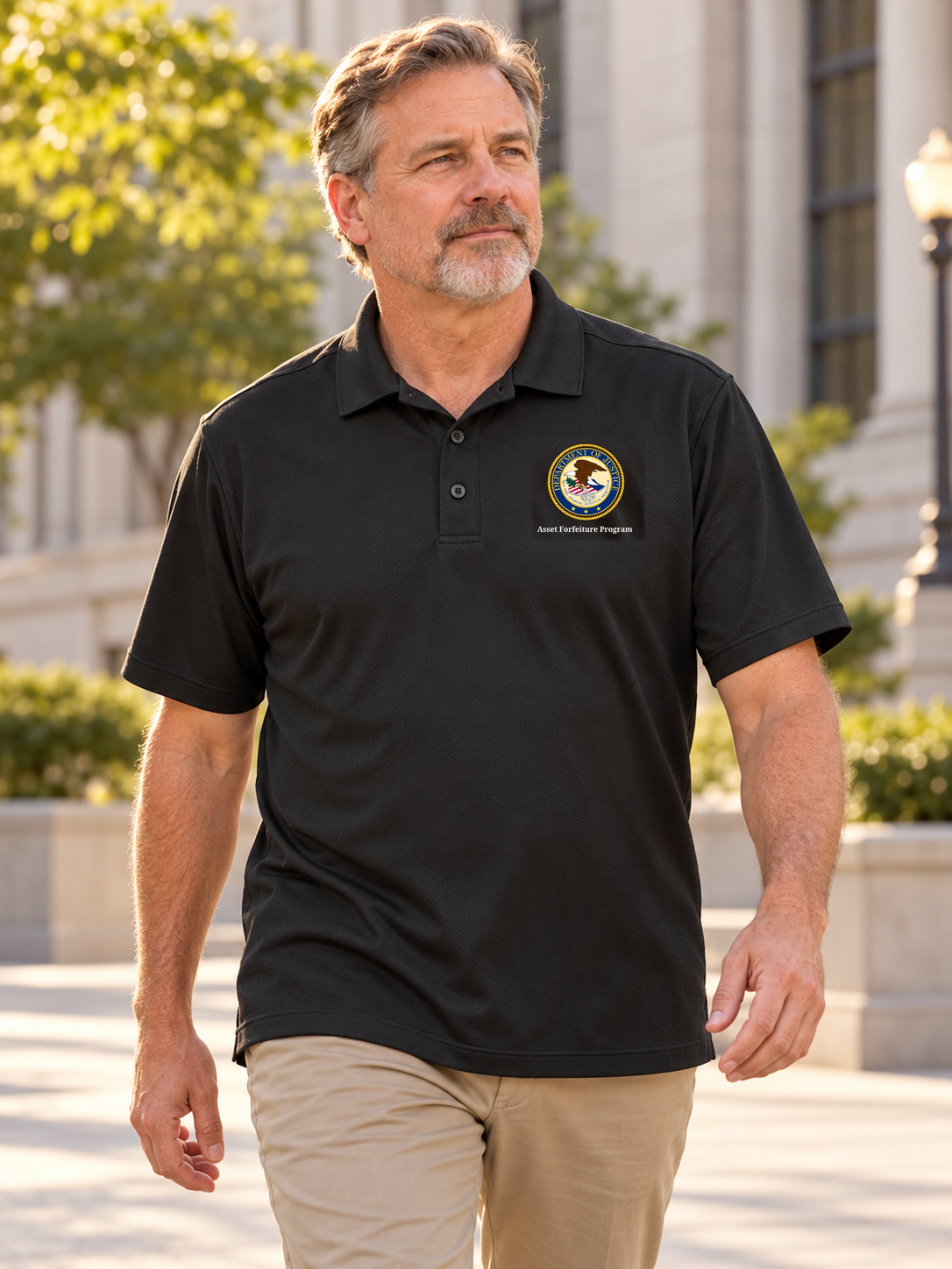Asset Forfeiture Program men's black K540 polo with original Department of Justice seal and source-matched agency caption