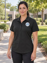 FLETC Women's Polo — Black lifestyle view