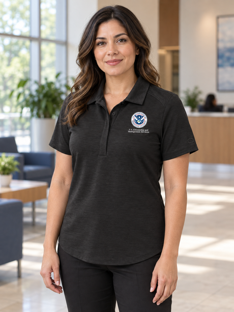USCIS Women's Polo — Black lifestyle view