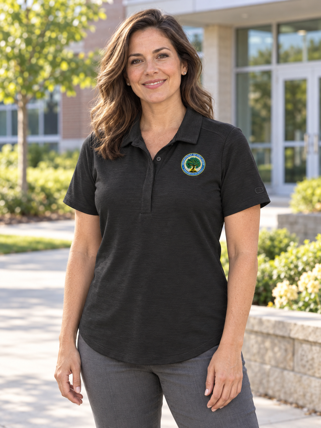 Department of Education Women's Polo — Black lifestyle view