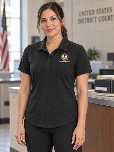 USMS Women's Polo — Black lifestyle product photograph