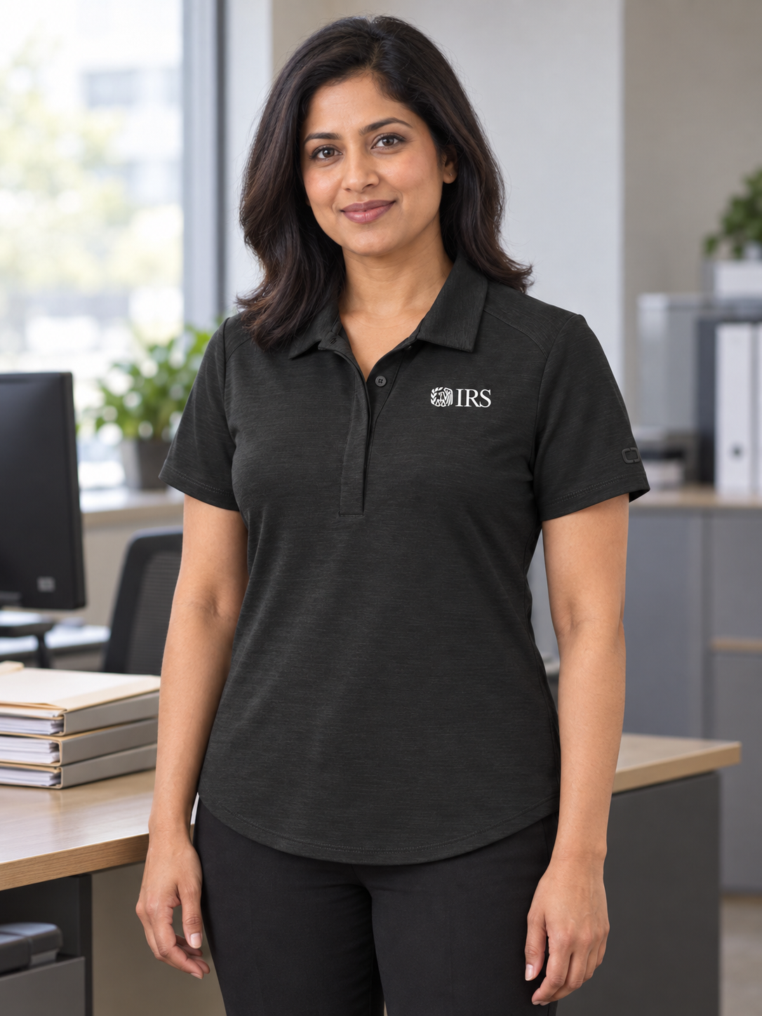 IRS Women's Polo — Black lifestyle product photograph