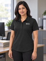 IRS Women's Polo — Black lifestyle product photograph