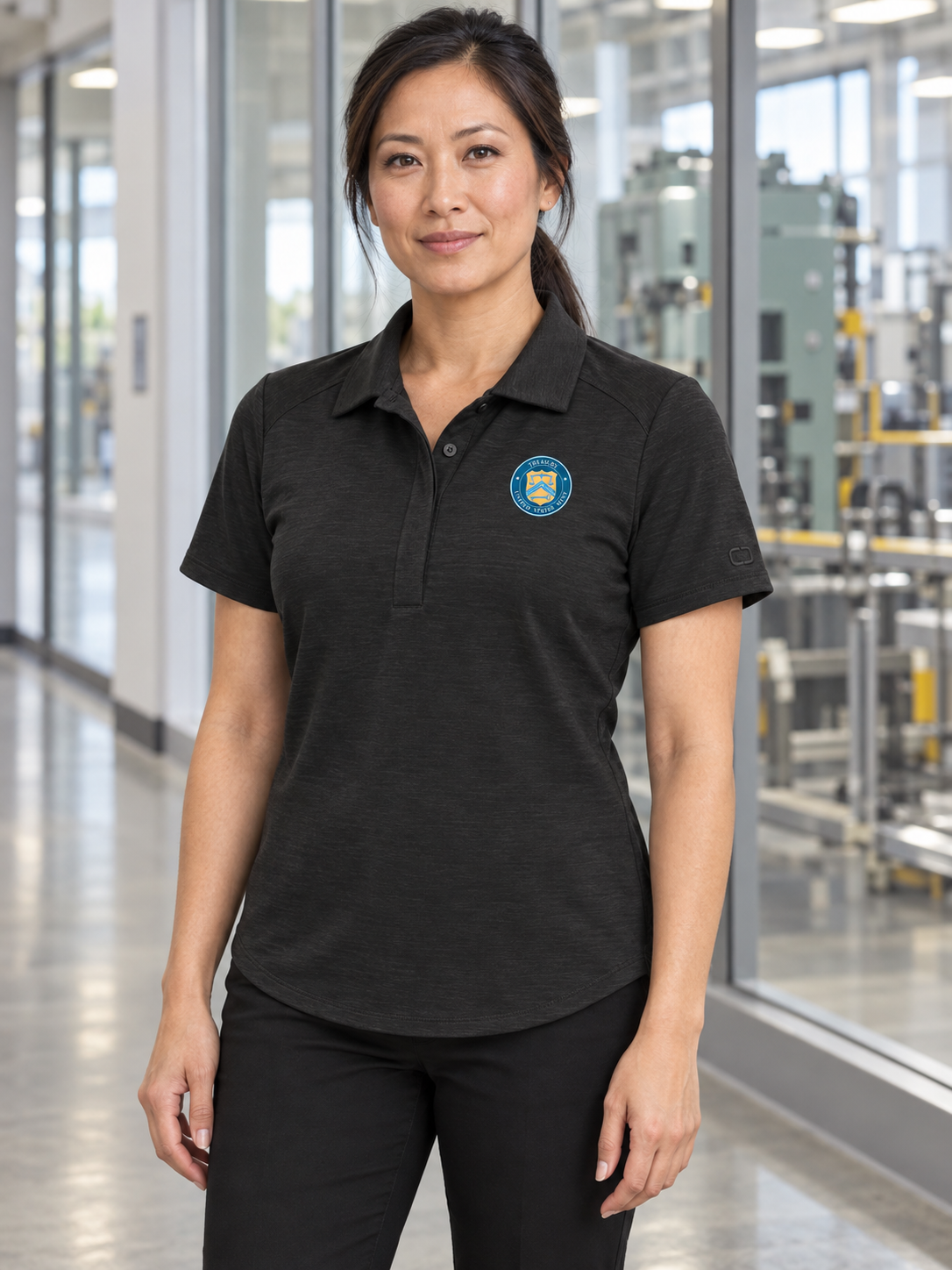 UM Women's Polo — Black lifestyle product photograph