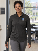 FLETC Women's Motion 1/4 Zip — Black lifestyle product photograph