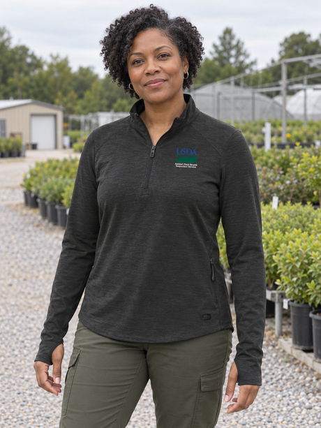 APHIS Women's Motion 1/4 Zip — Black lifestyle product photograph