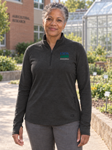 NIFA Women's Motion 1/4 Zip — Black lifestyle product photograph