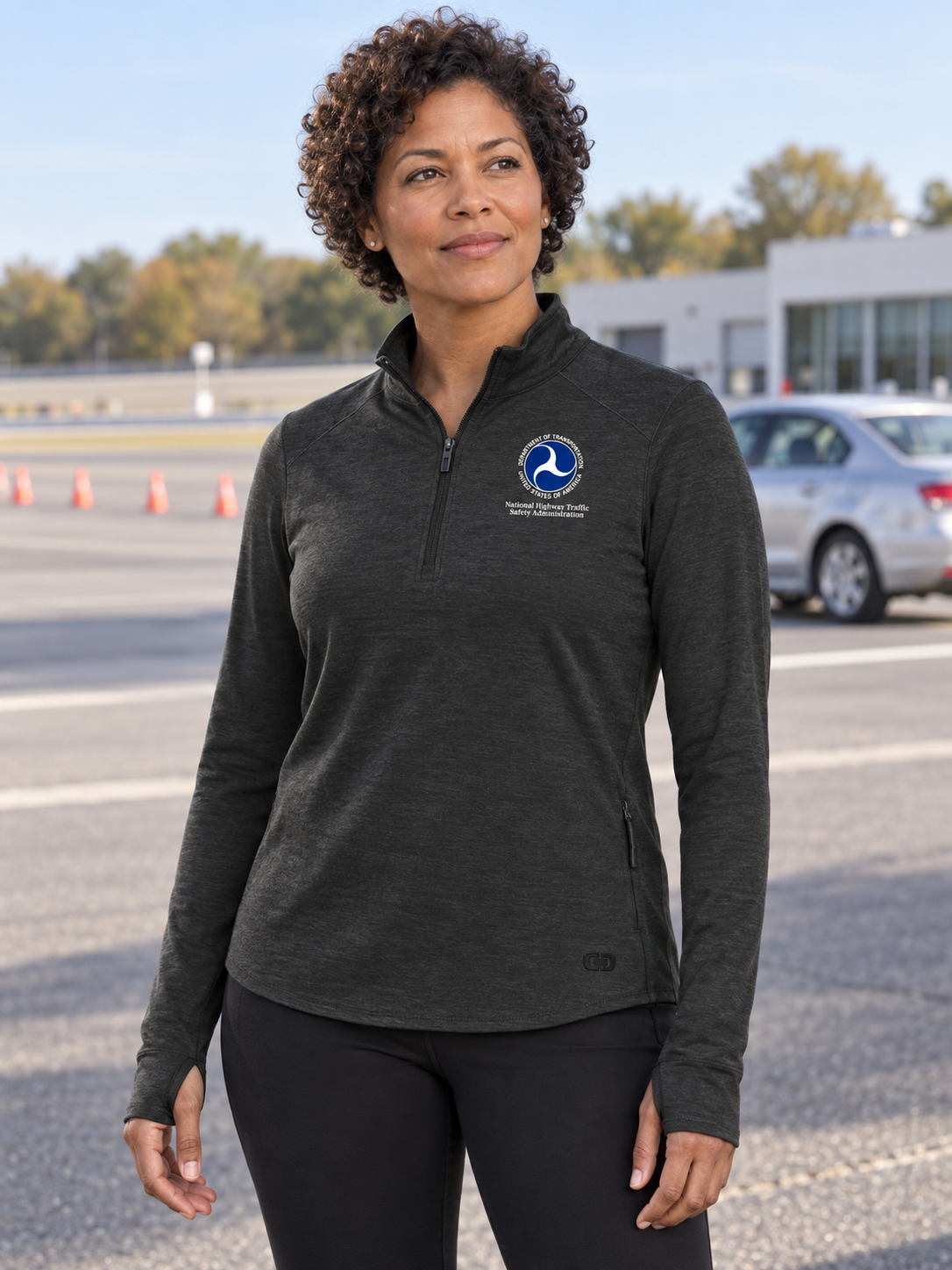 NHTSA Women's Motion 1/4 Zip — Black lifestyle product photograph