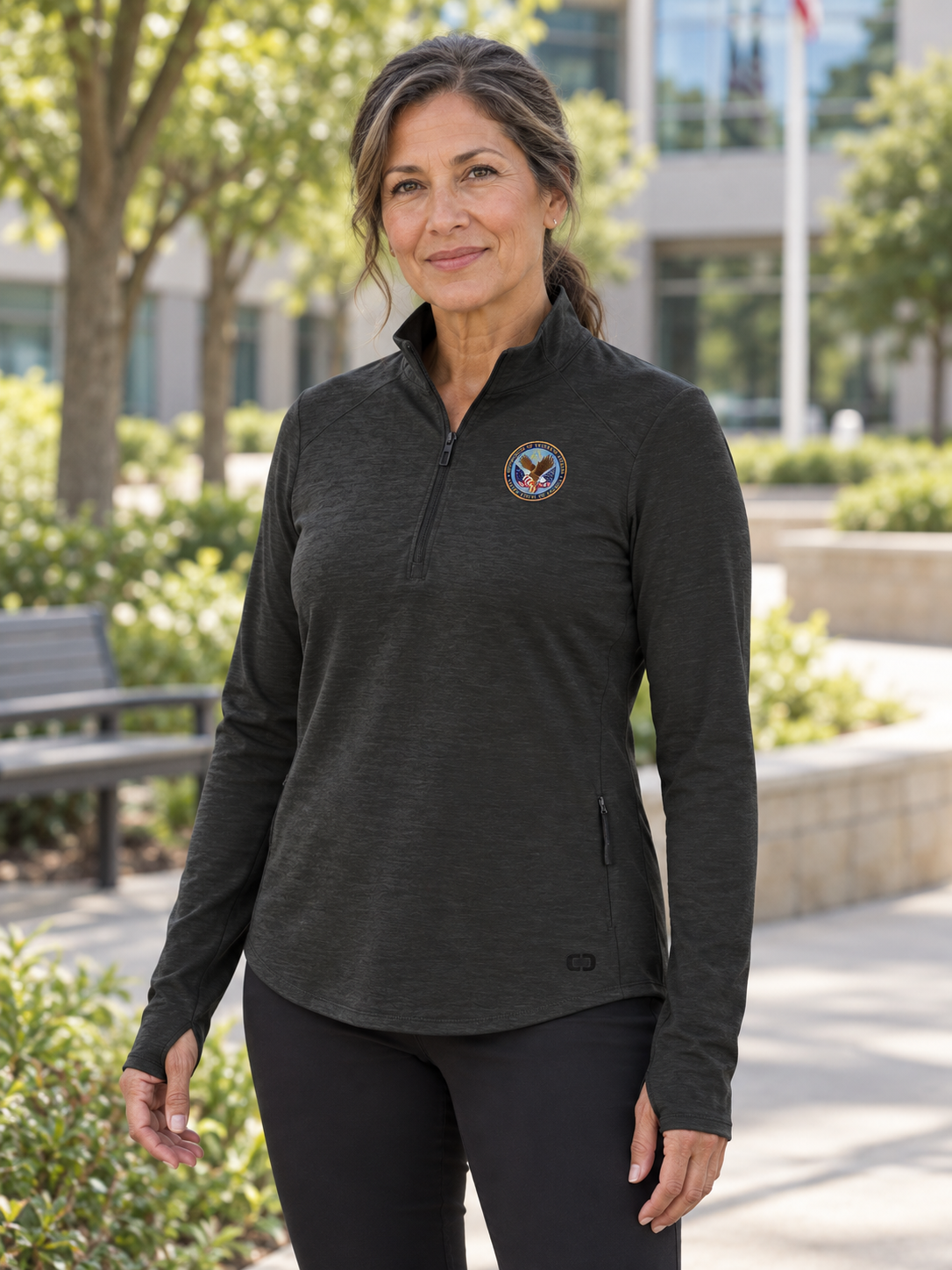 VA  Women's Motion 1/4 Zip — Black lifestyle product photograph