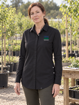 APHIS Women's Commuter Shirt — Black lifestyle product photograph