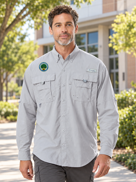 Department of Education Men's Columbia Bahama II in Cool Grey, education office campus lifestyle portrait with exact own-source Department of Education seal.