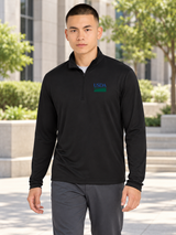 USDA black men's long-sleeve quarter-zip with the original blue and green USDA artwork on the wearer's left chest, shown outdoors in the approved office courtyard scene.